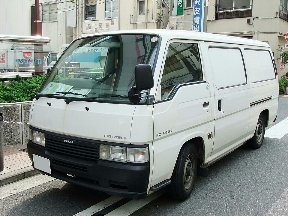Badly cropped photo of a white van